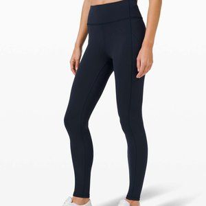 Lululemon Invigorate Pocketed 23" Navy Leggings size 4 fit more like 2